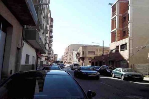 1070m2 complete building of apartments and business premises for sale in C/ Monduber