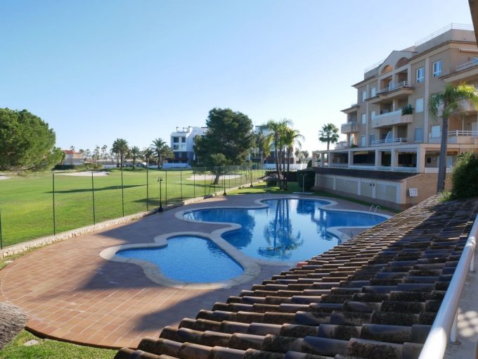 EXCM-OlivaNova2. A 67 golf apartment with parking and pool for sale in Oliva Valencia Spain